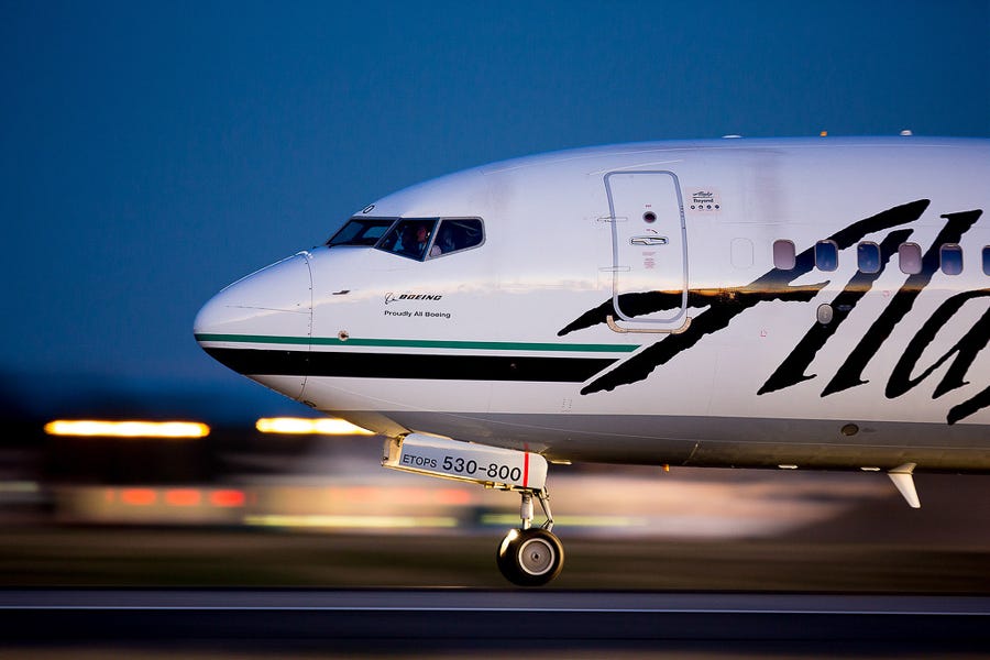 alaska airlines hand carry weight